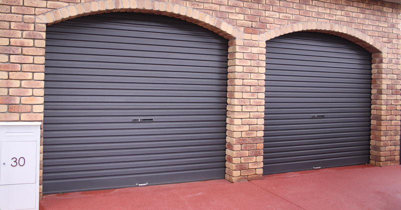 Large double lock-up garage with built-in pantry and shade sail